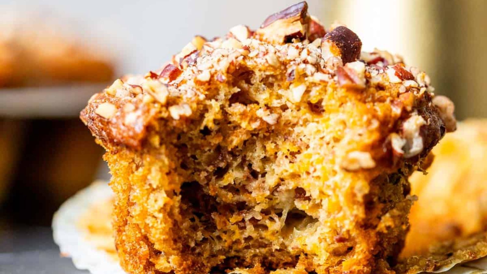 Banana carrot muffin with  bite.