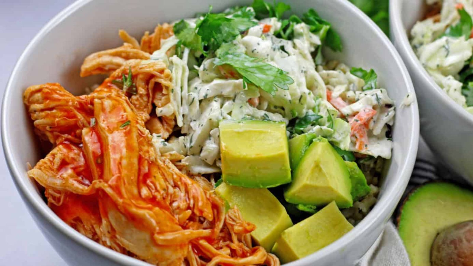 Buffalo chicken and rice in a bowl.