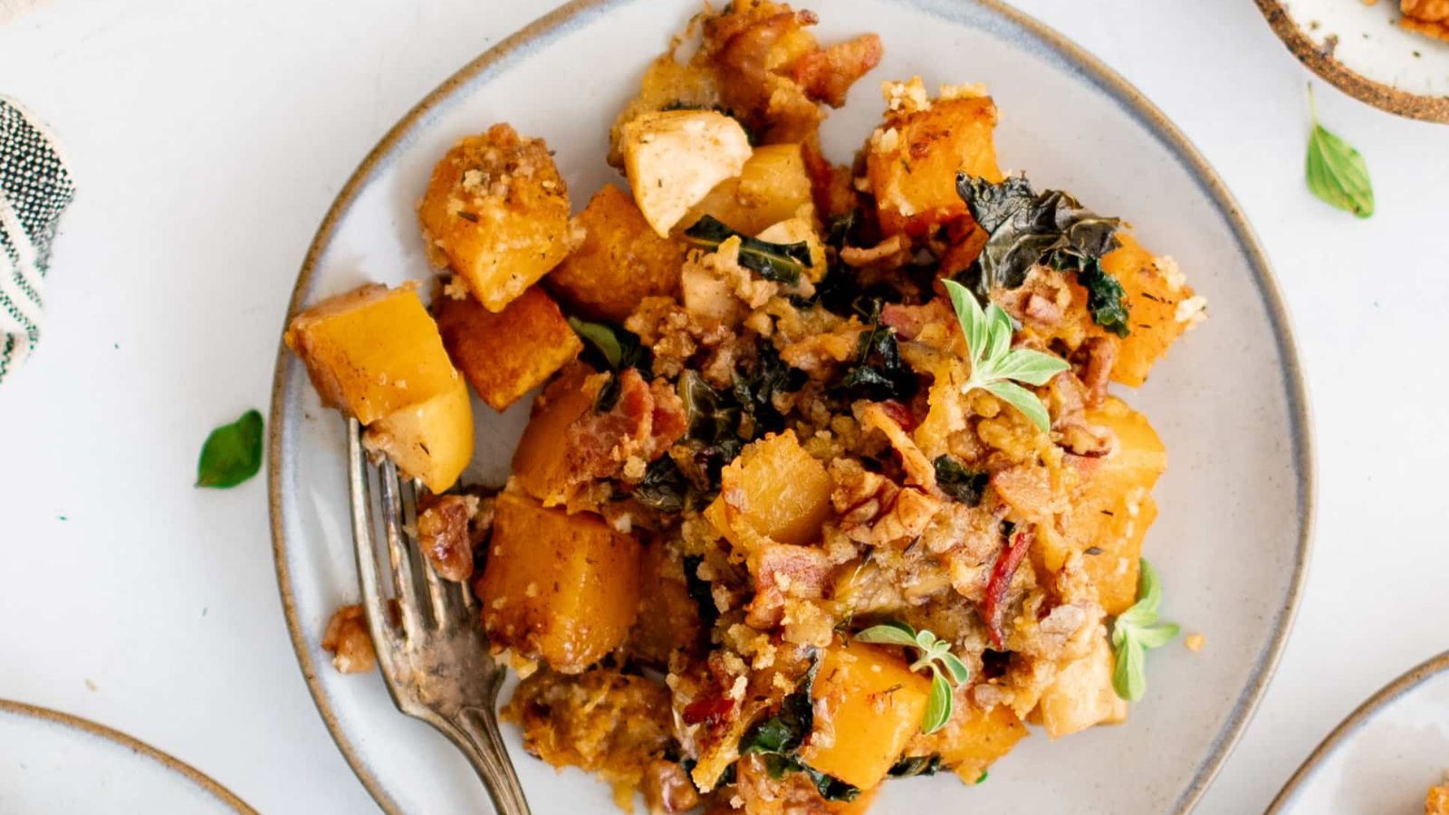 Butternut squash casserole on a plate.