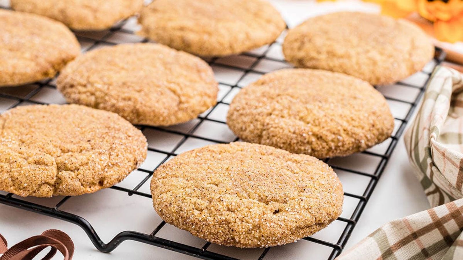 Pumpkin cookies on a strainer.