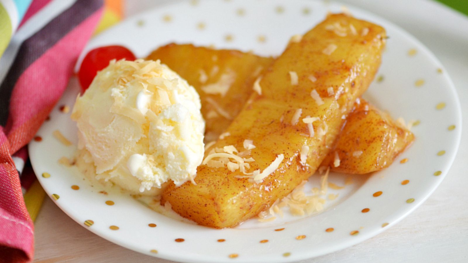Fried pineapple slices with cinnamon.