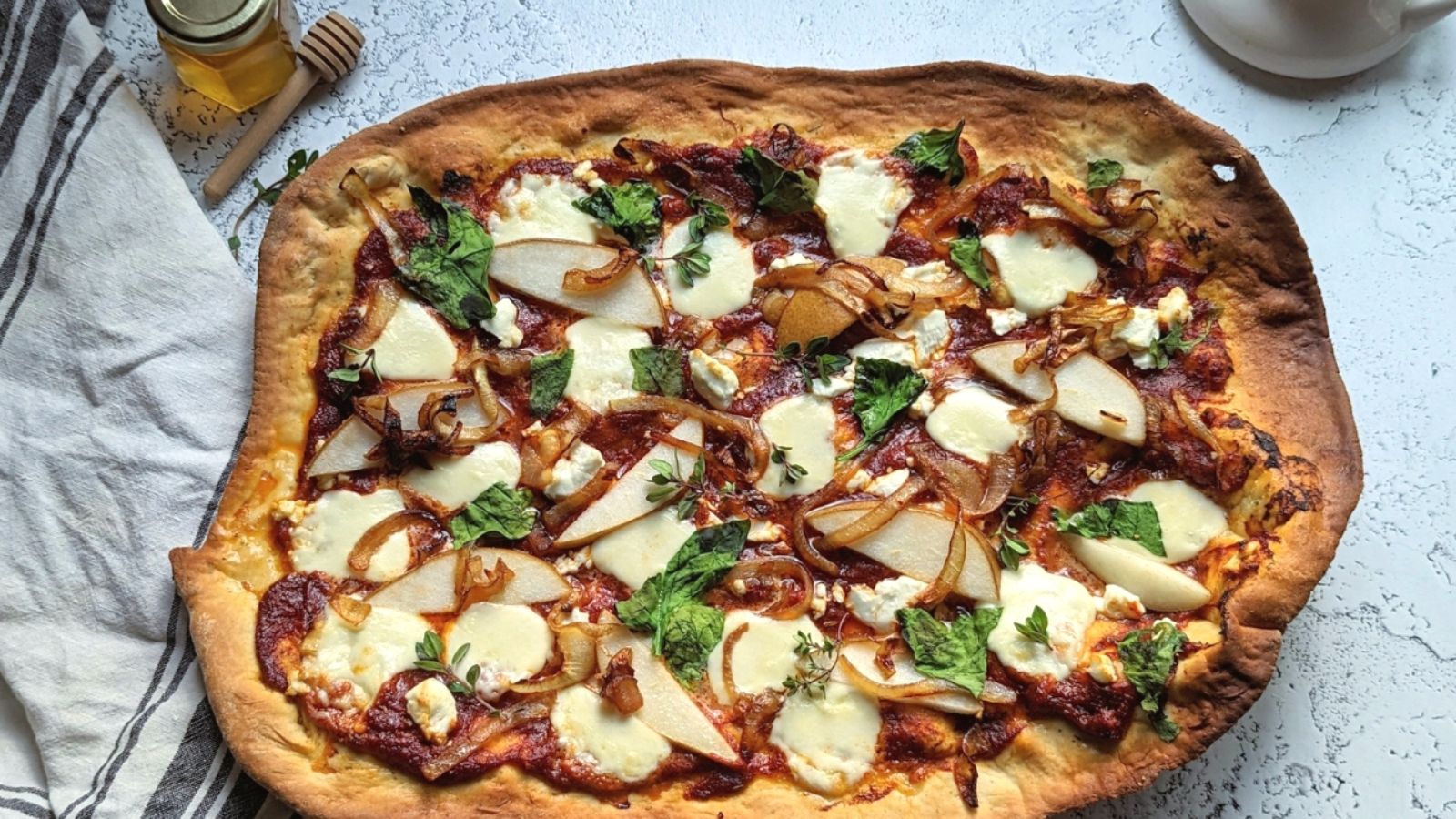 Goat cheese pizza with caramelized onion.