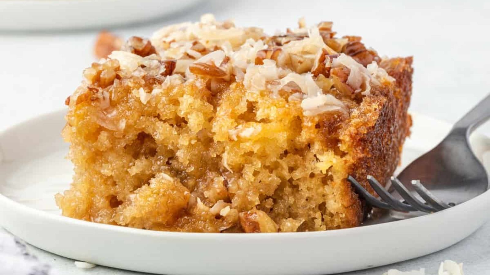 A slice of granny cake on a plate.