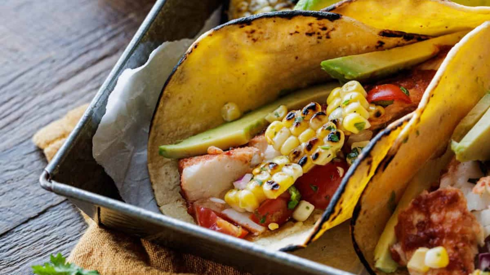 Grilled halibut tacos with corn.