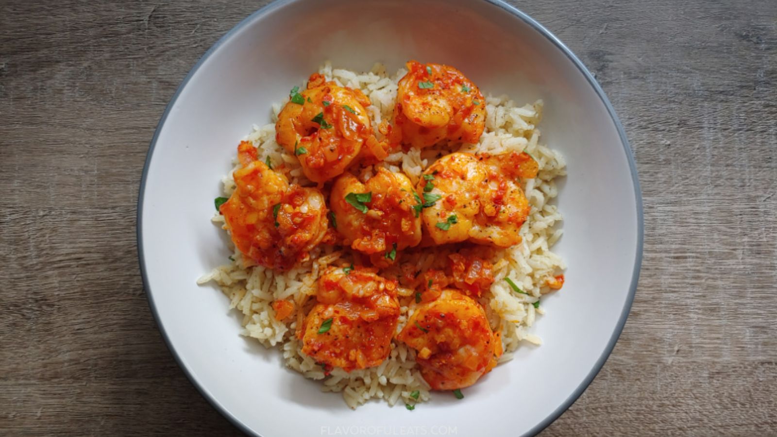 Rice with shrimp on top.