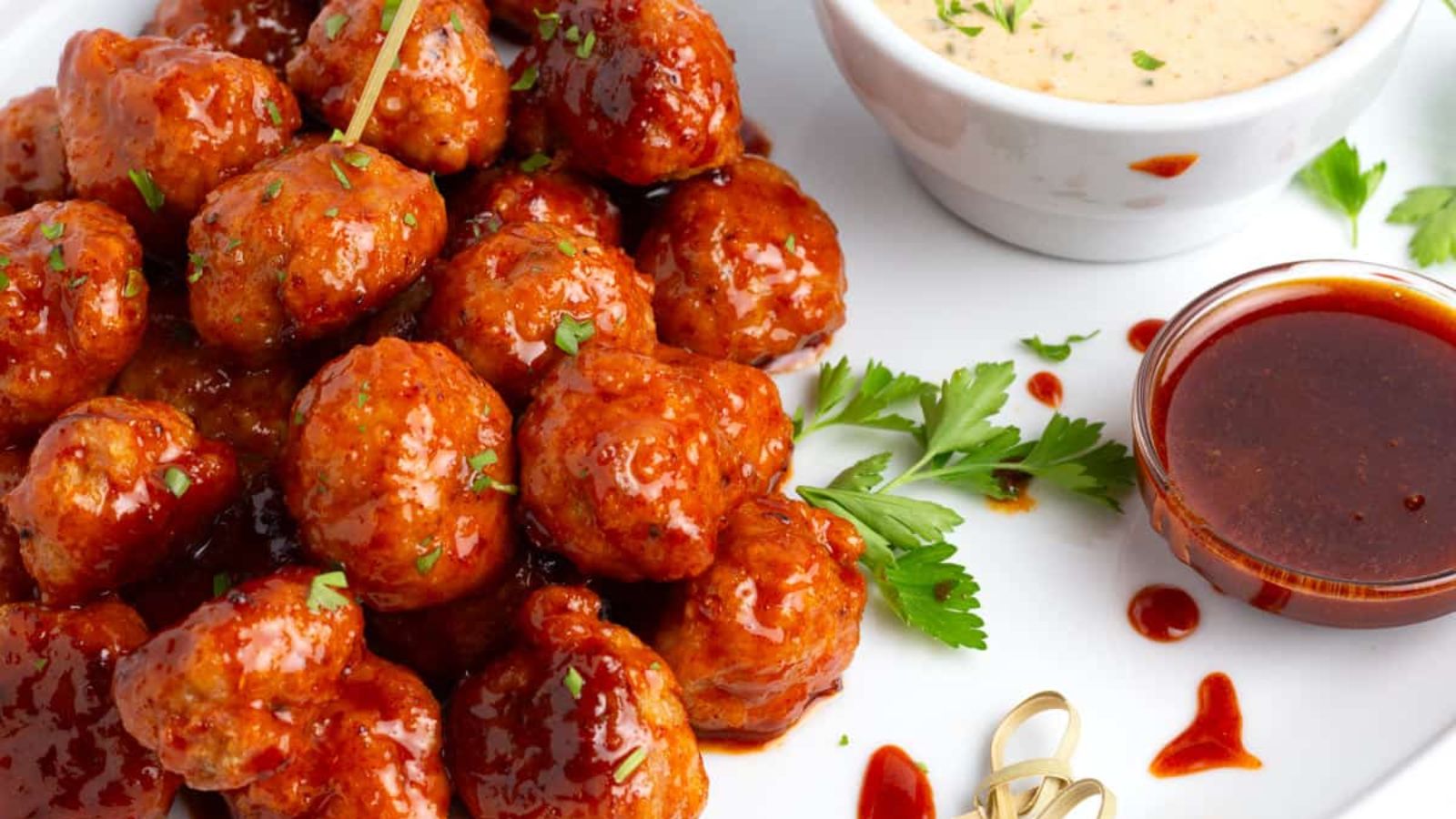 Meatballs with dips on the sides.