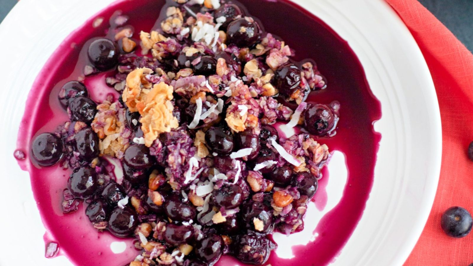 Blueberry crisp on a plate.