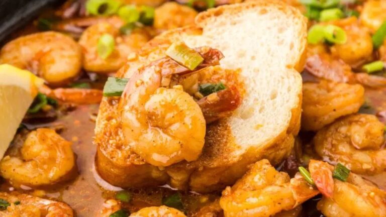Bread with shrimp on top.