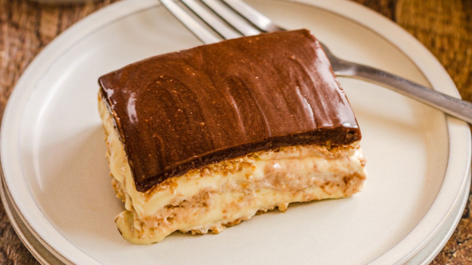 A slice of eclair cake on a palte.