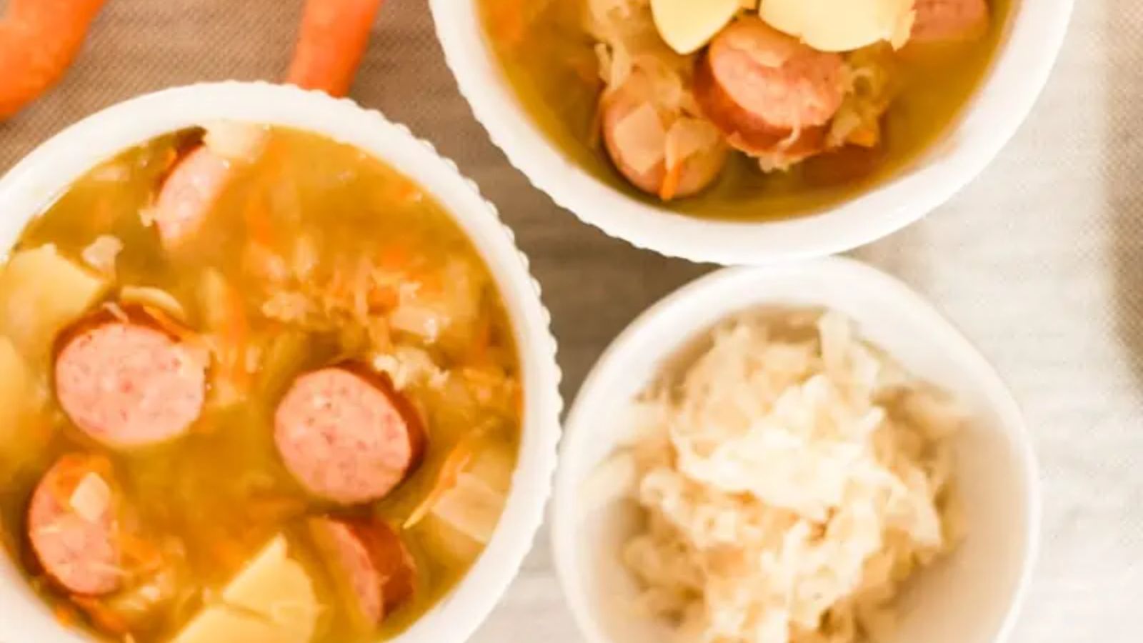 Bowls of soup with sausage.