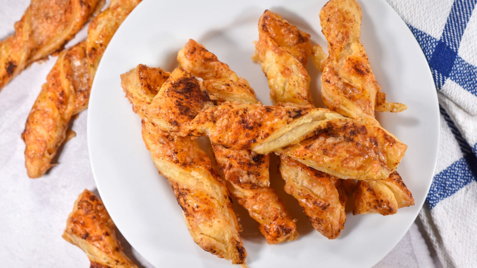 Puff pastry twists on a plate.