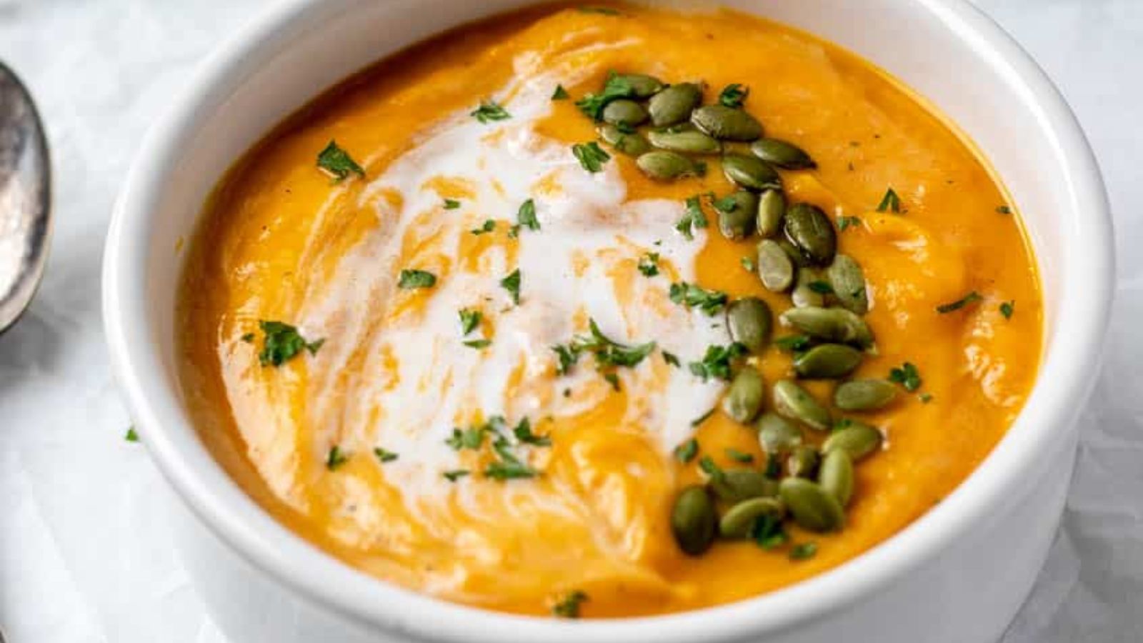 Squash soup with toppings.