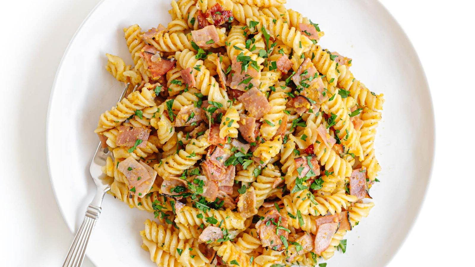 Pasta with ham and egg.