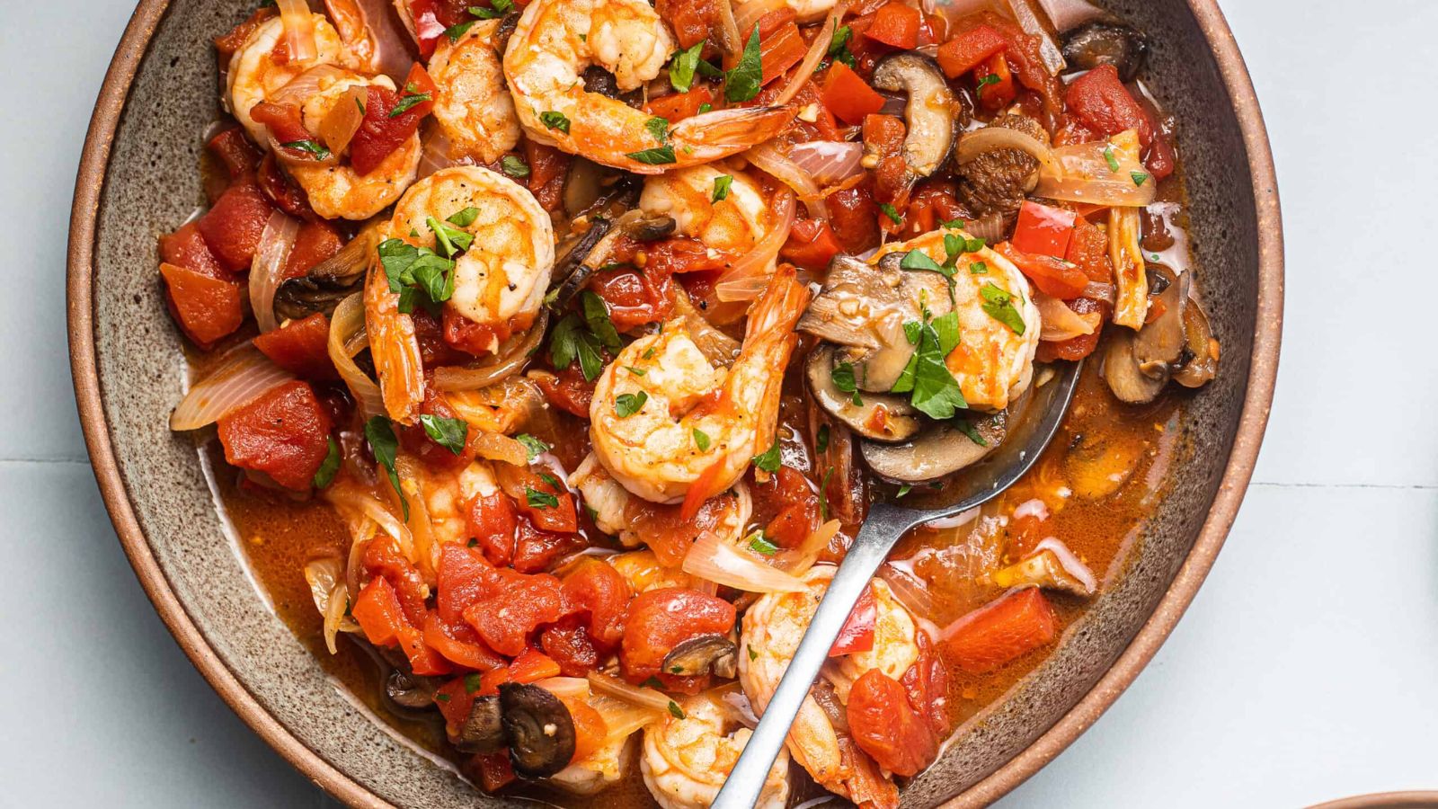 Shrimp cacciatore on a plate.