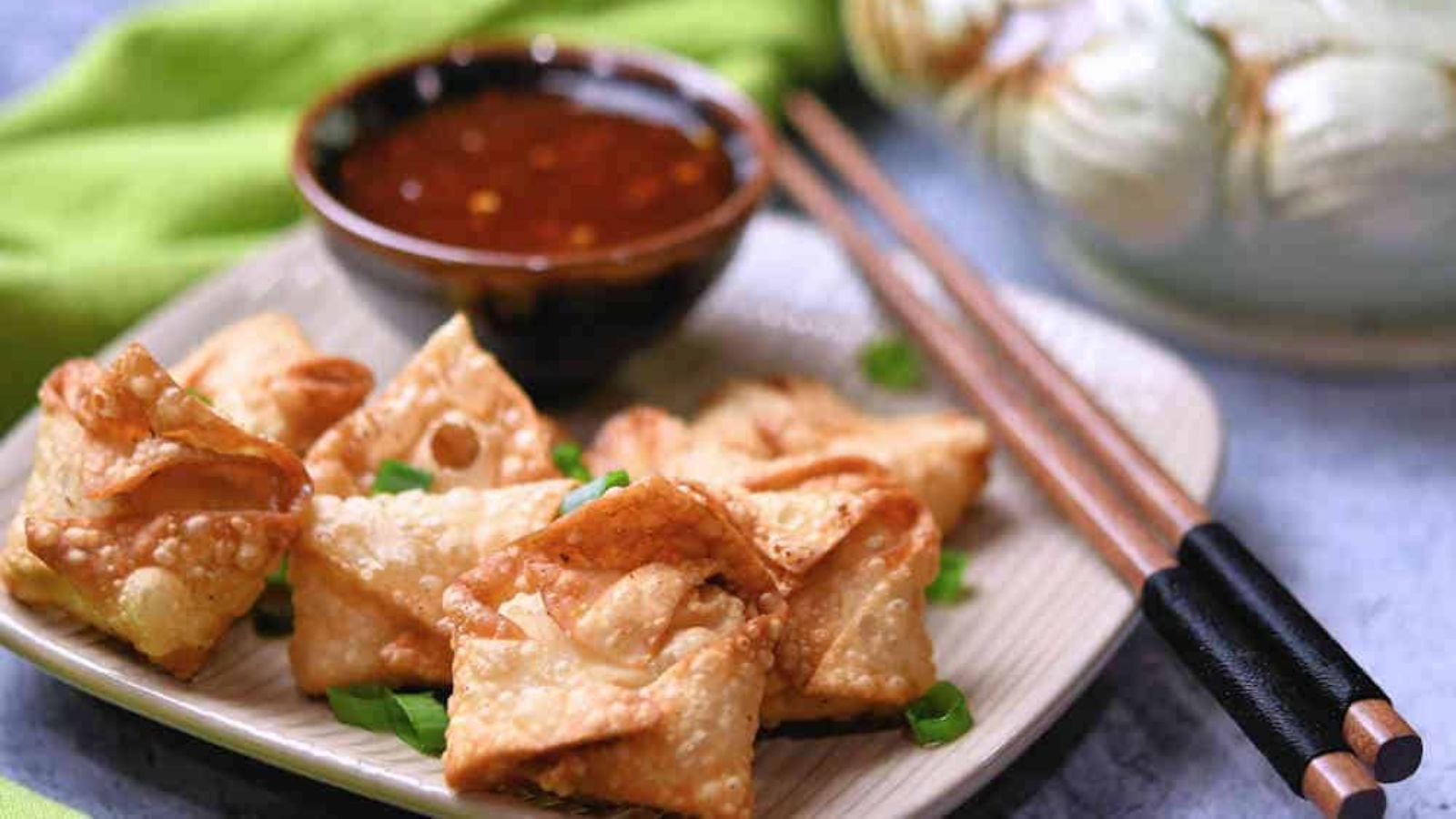 Shrimp rangoon fried cheese wonton with dip.