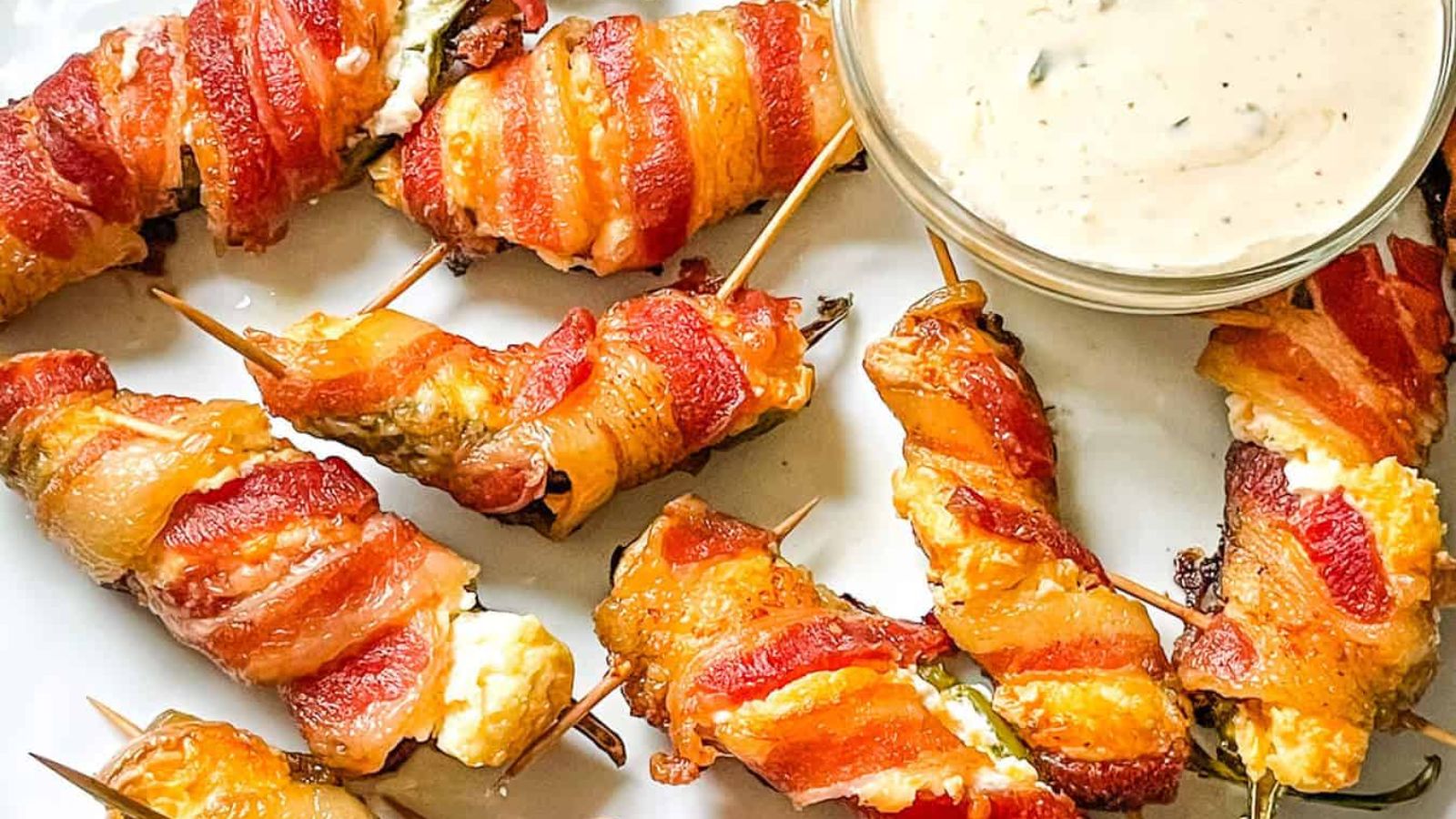 Jalapeno poppers with dip on the side.