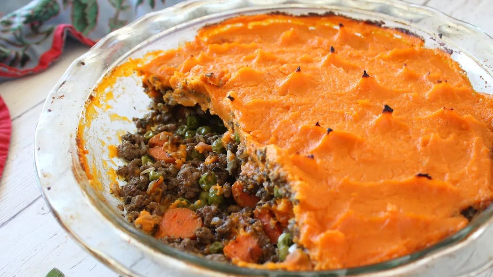 Sweet potato shepherd's pie on a glass plate.