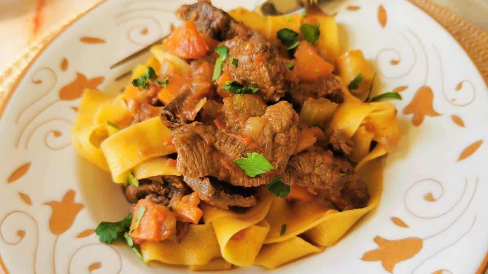 Venison ragu with pappardelle on a plate.
