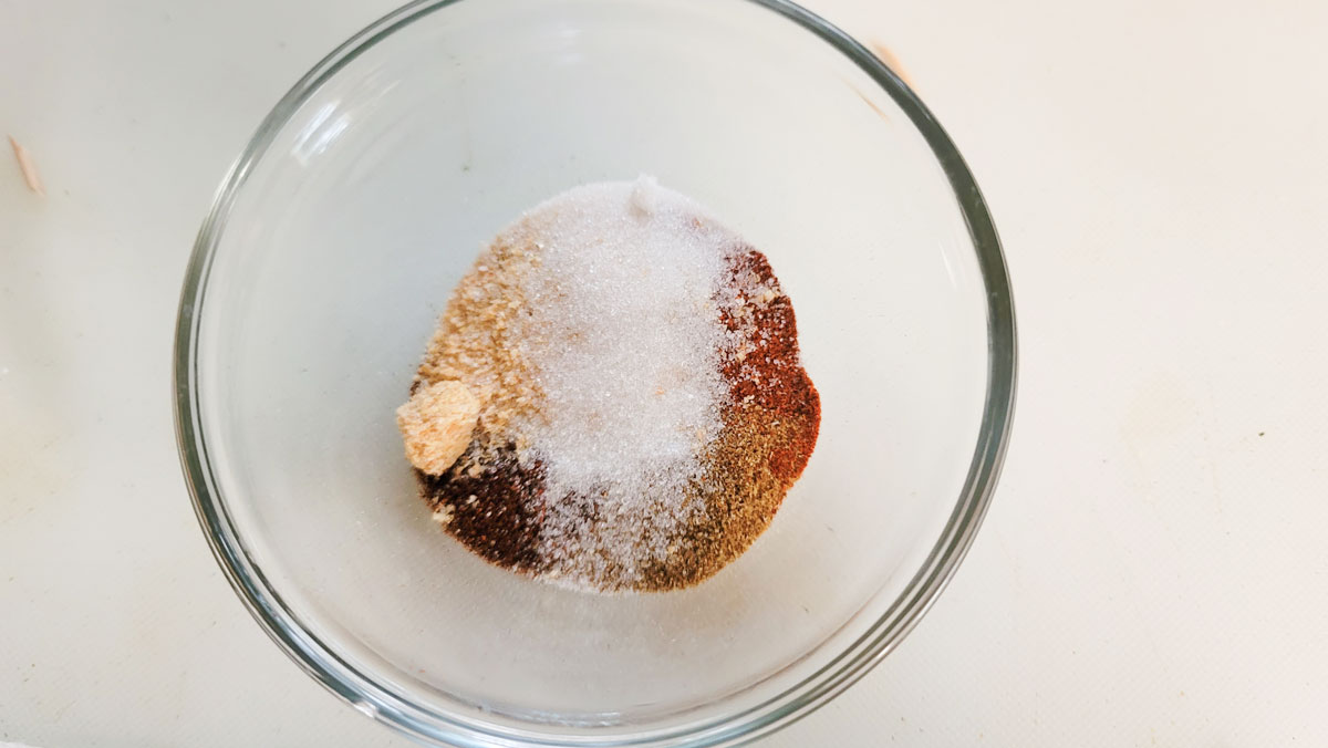 Rub ingredients added to a small bowl.