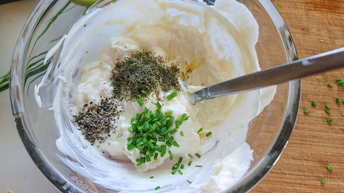 Herbs added to the cream cheese mixture.