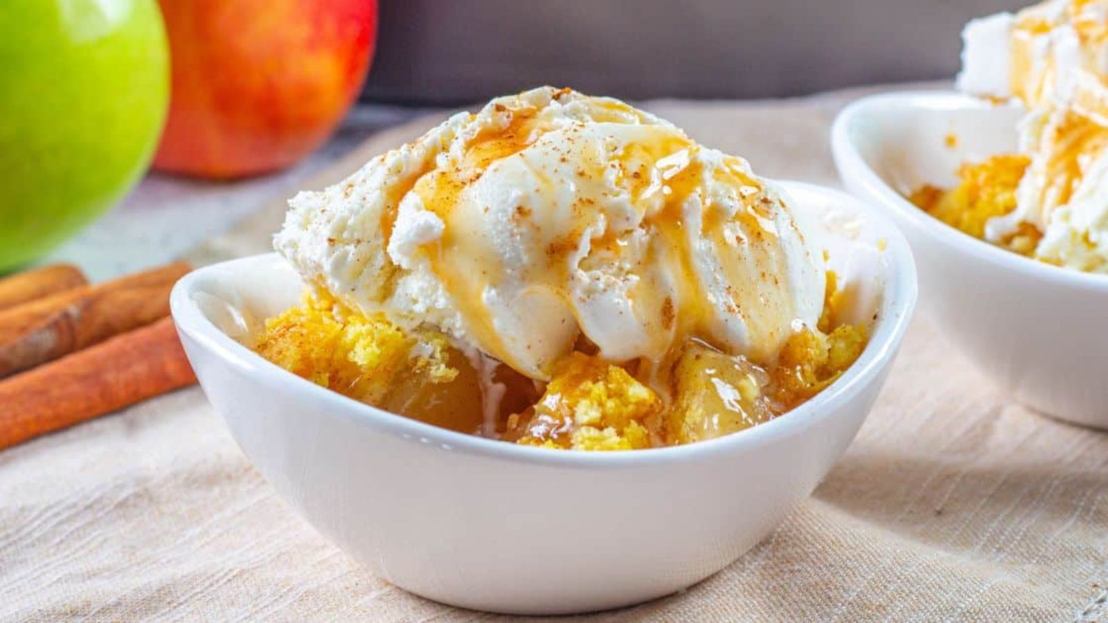 Apple dump cake in a bowl.