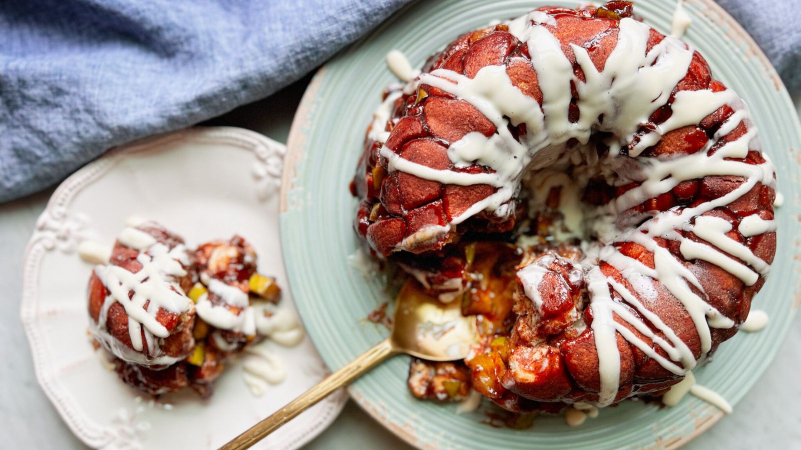 Apple monkey bread with cream cheese glaze.