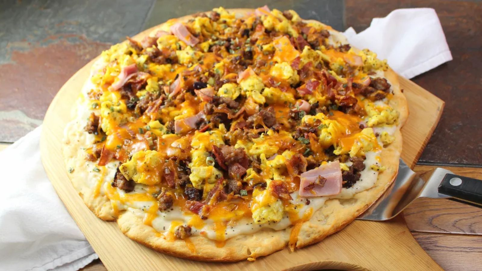 Pizza on a wooden pizza board.