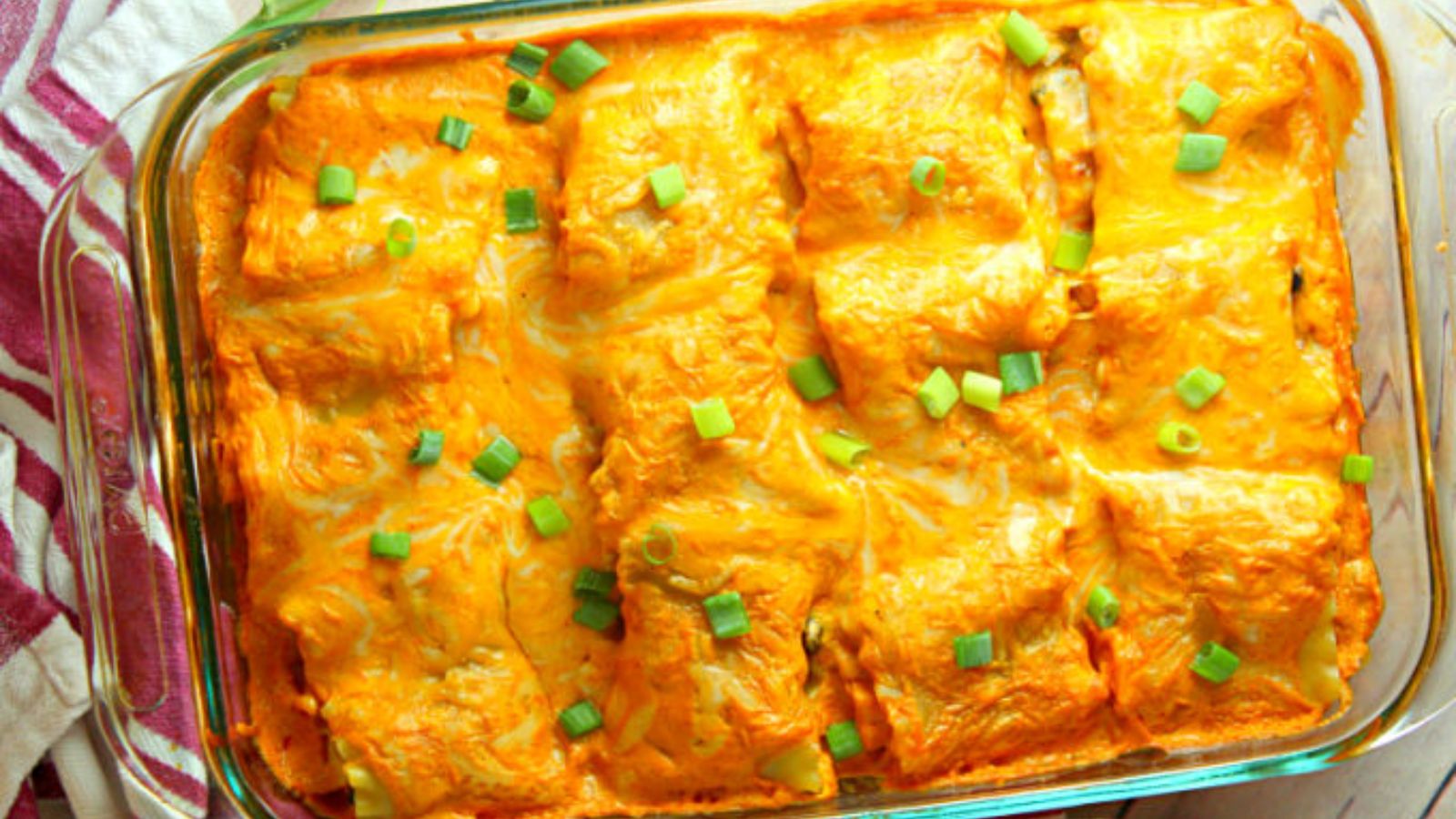 A tray of chicken lasagna rolls.