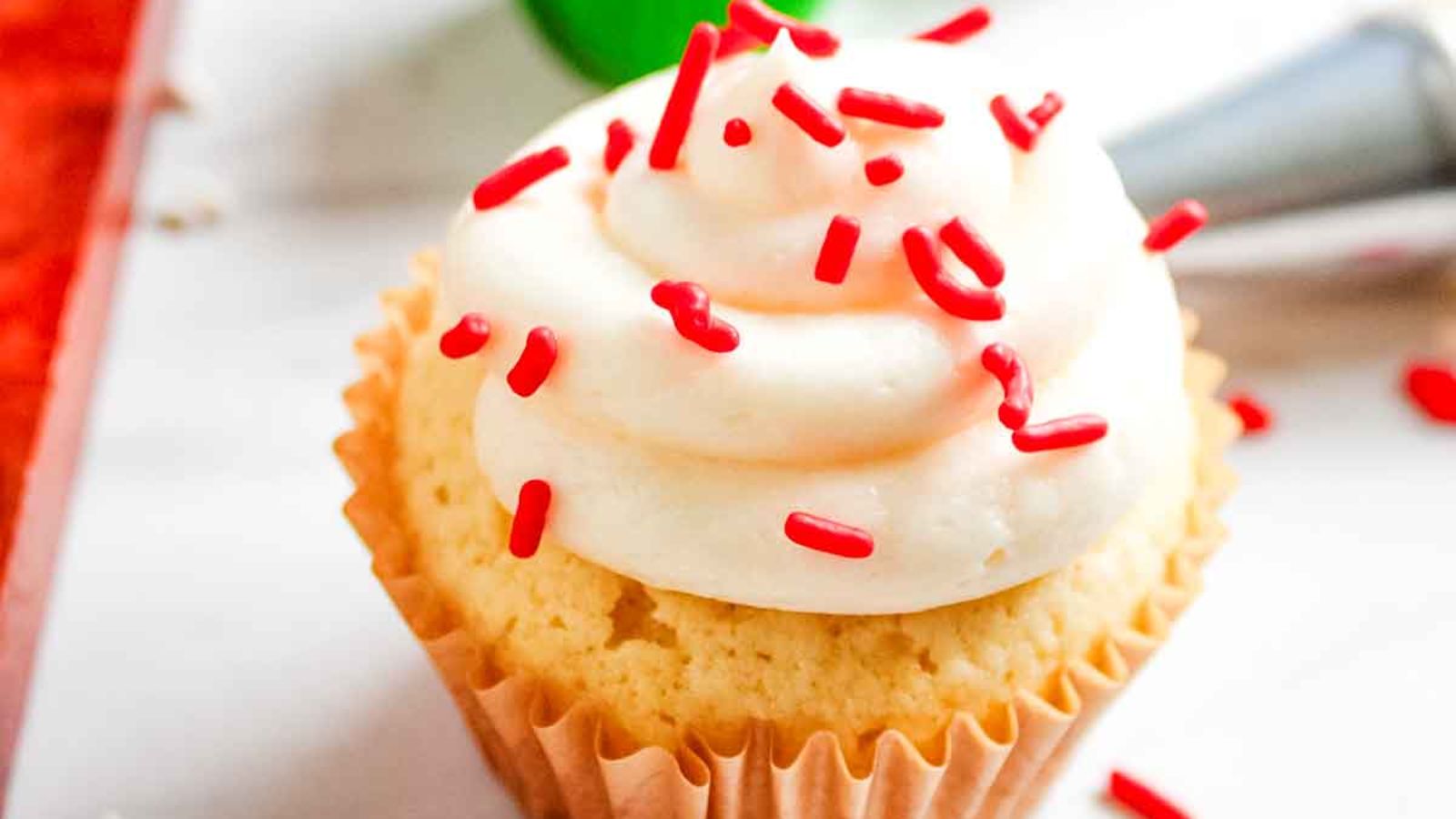 Cupcake with sprinkles on top.