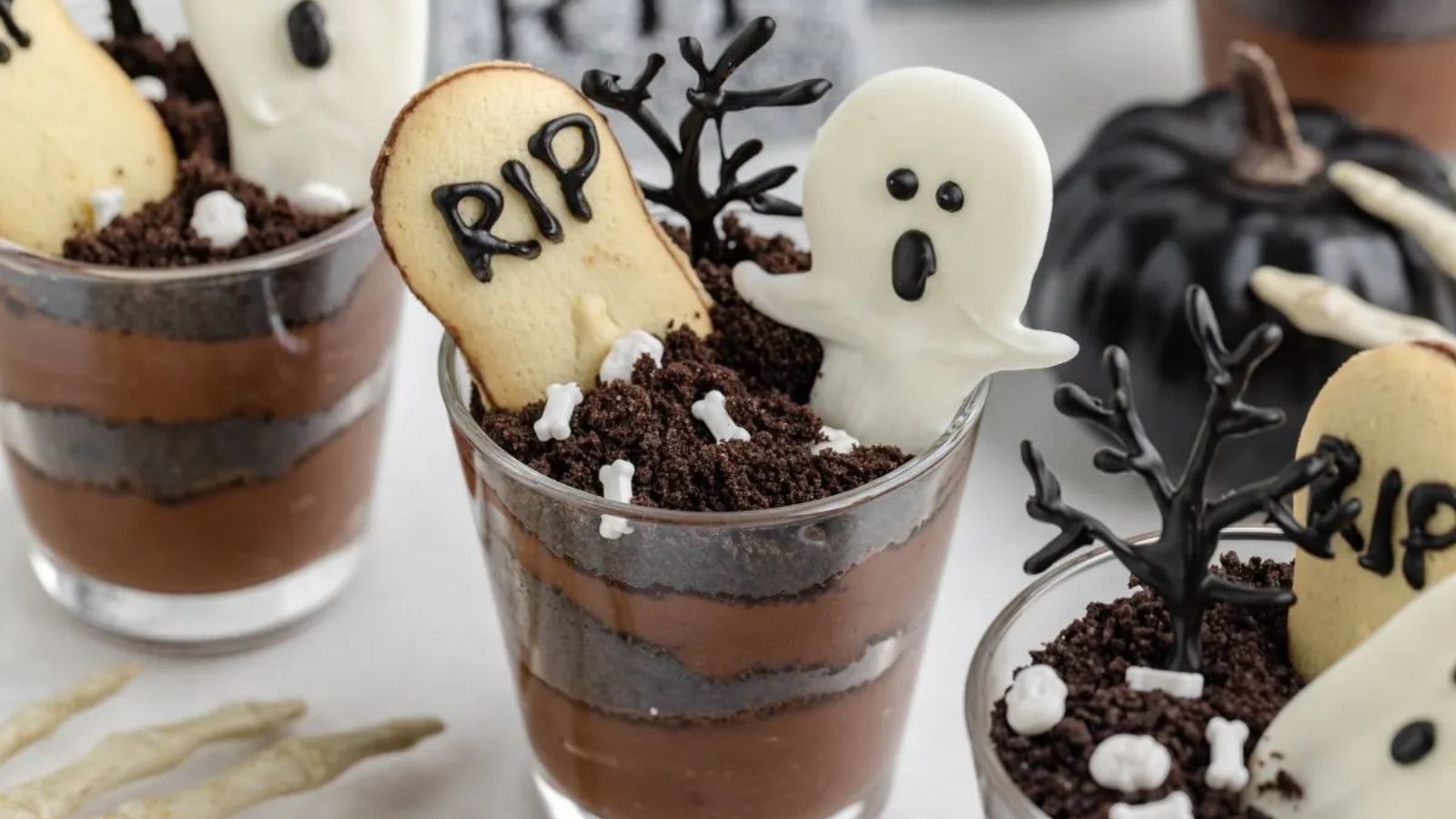Graveyard pudding cups.