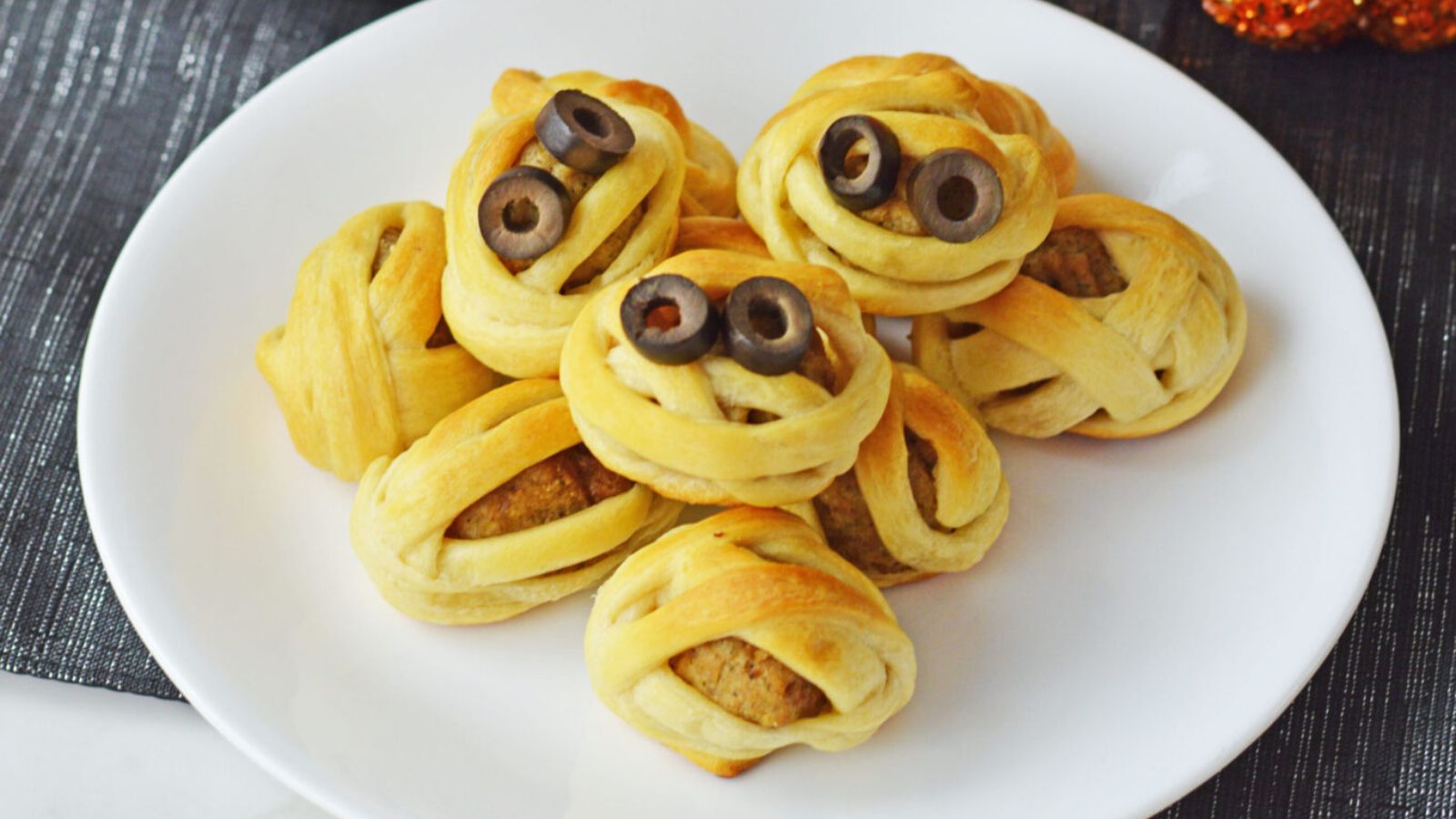 Halloween meatballs on a plate.