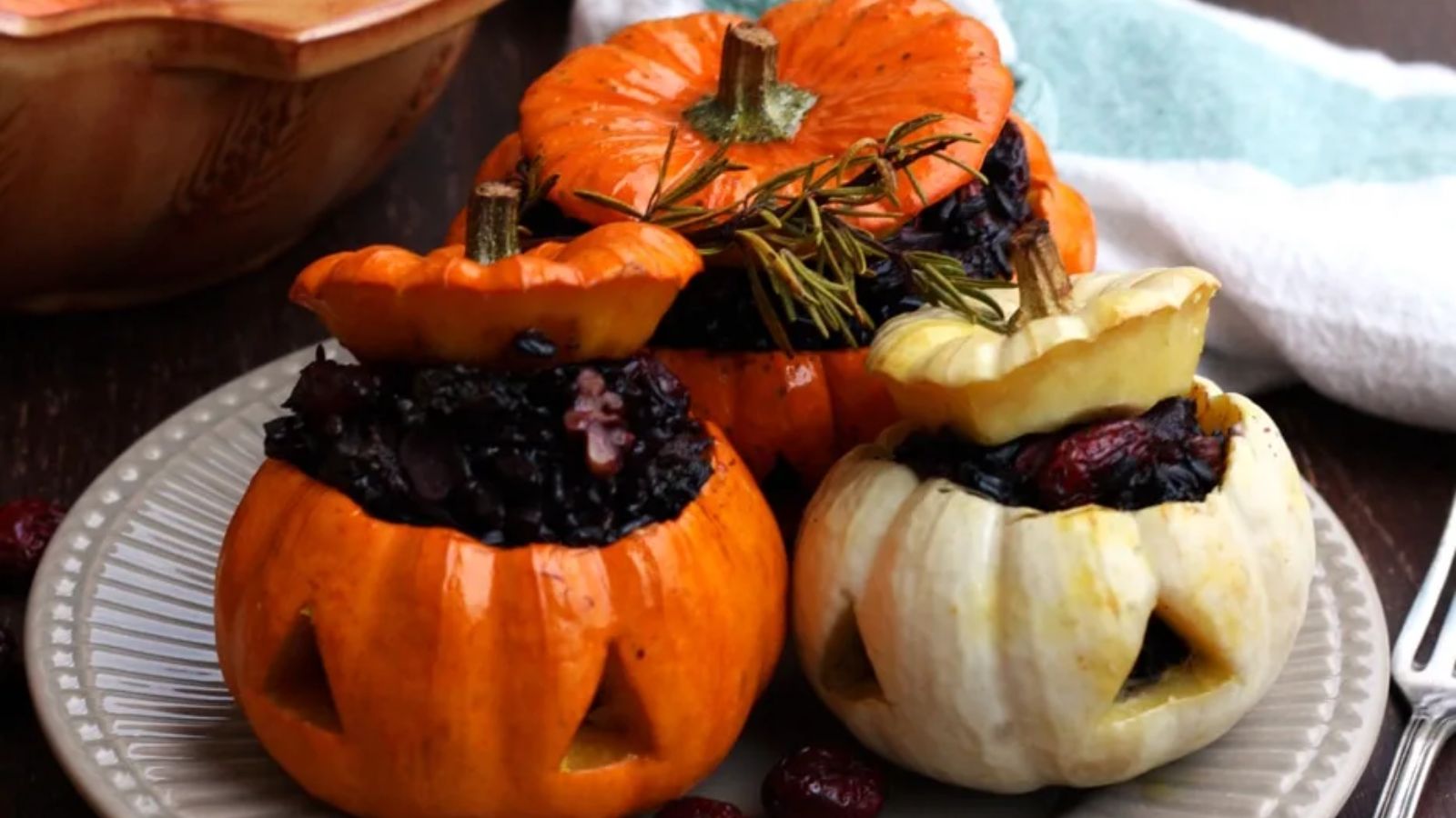 Three stuffed pumpkins. 