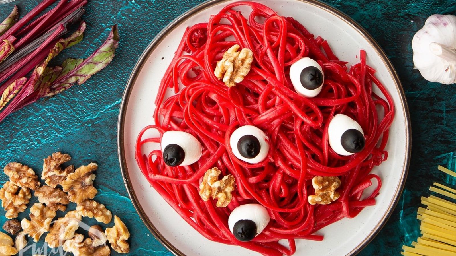 Red noodles with eyeballs.