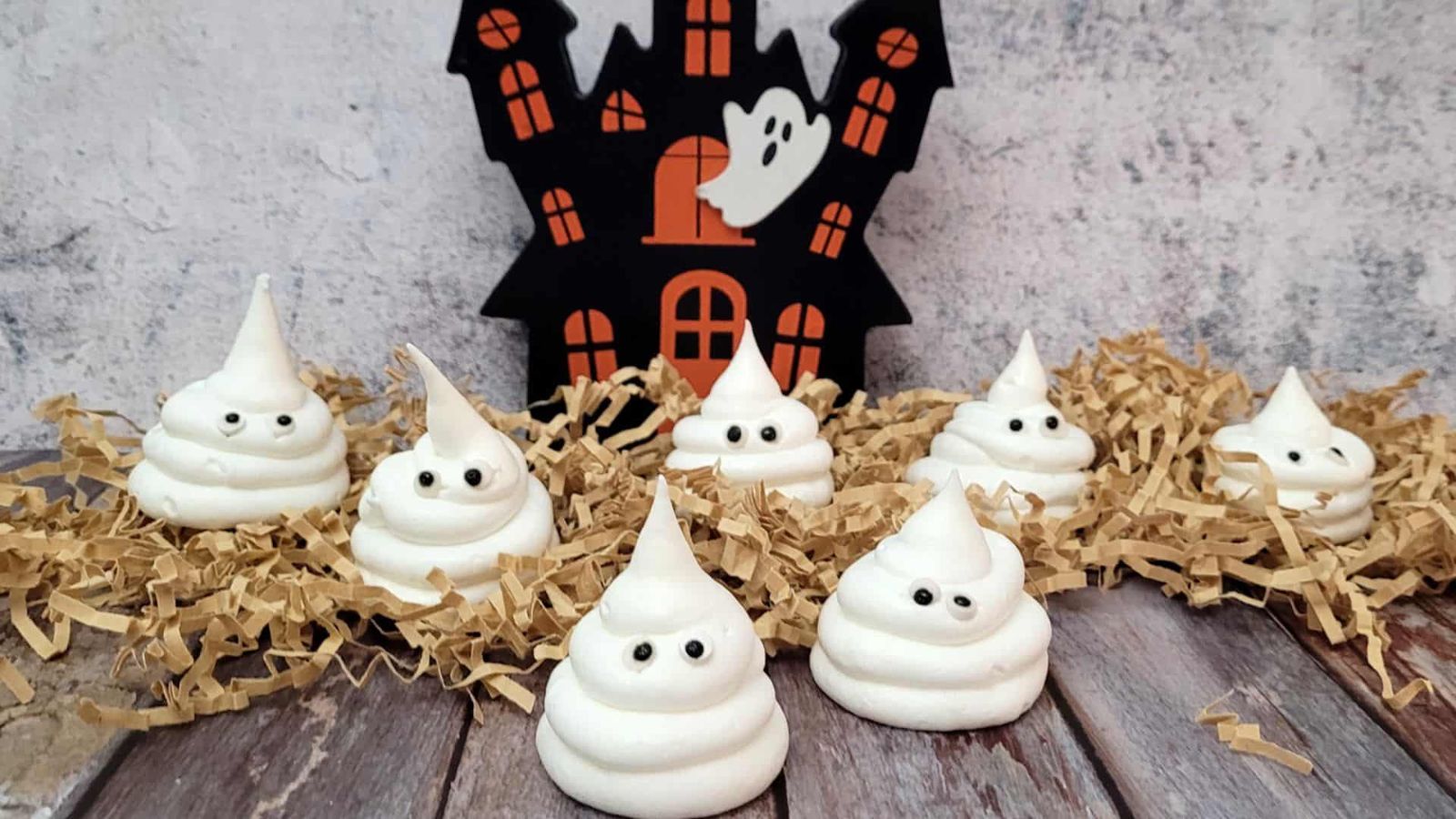 Meringue ghost with almond chocolate filling.