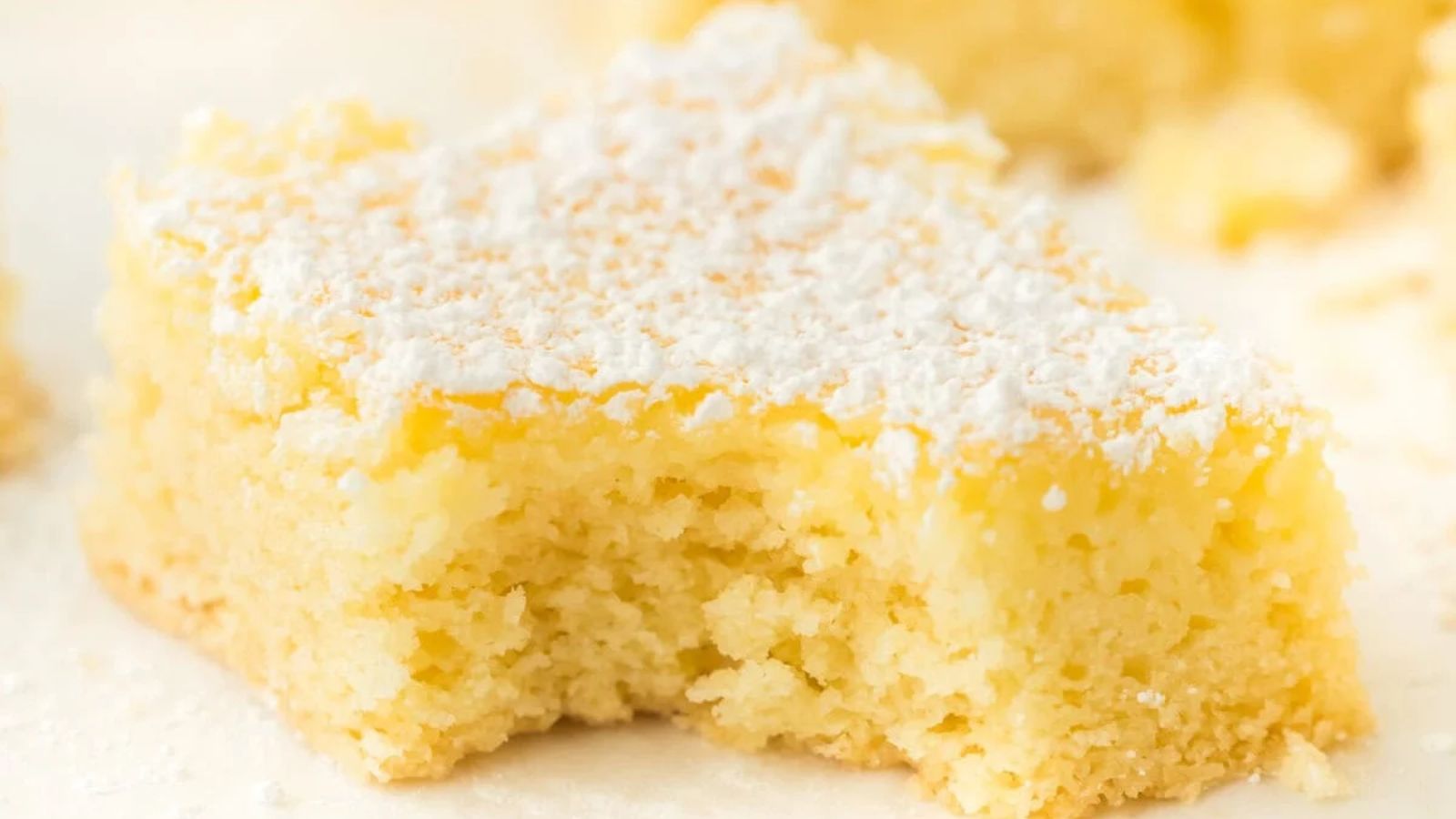A slice of butter cake with bite.