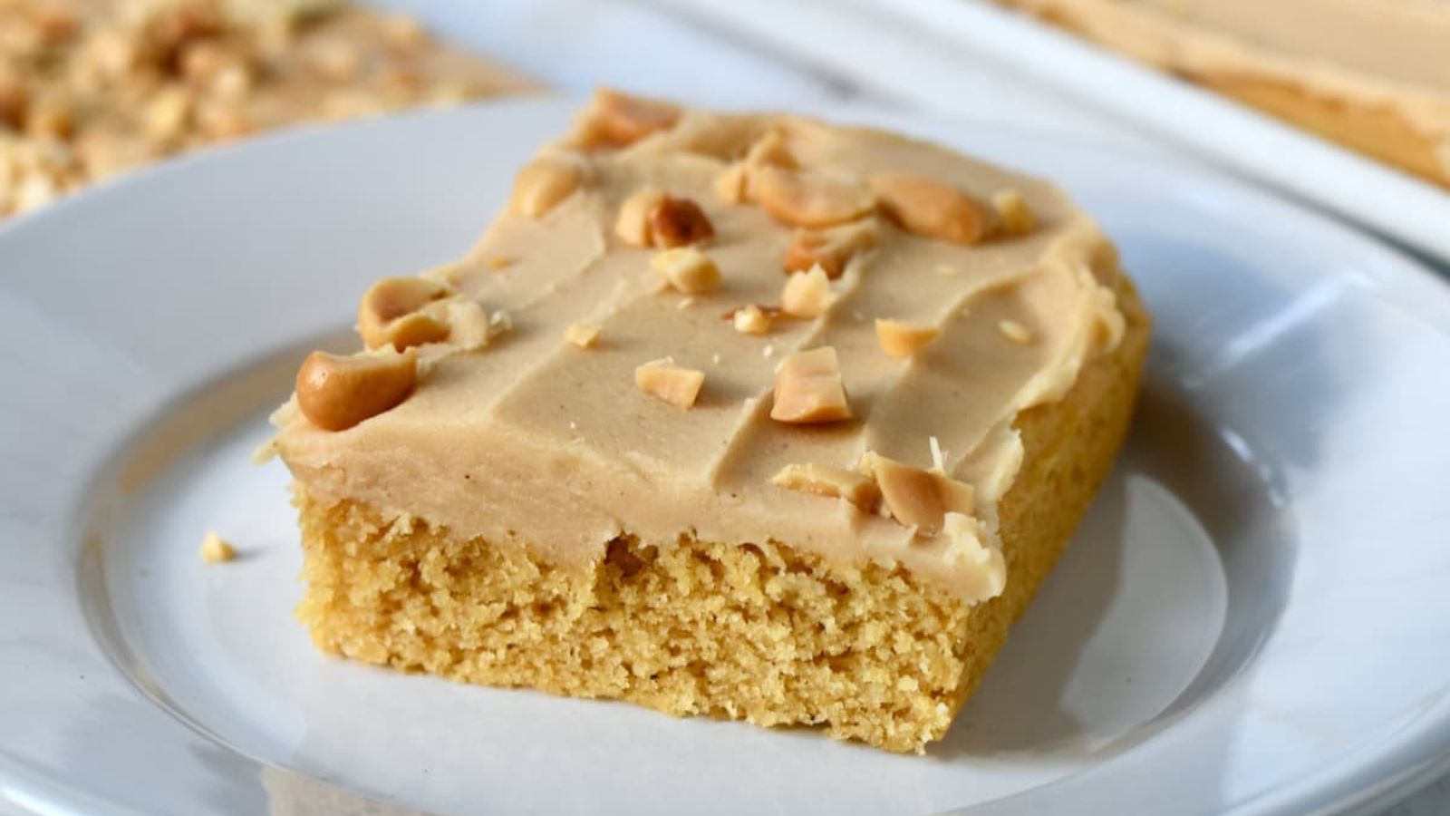Sheet cake with peanut butter frosting on top.