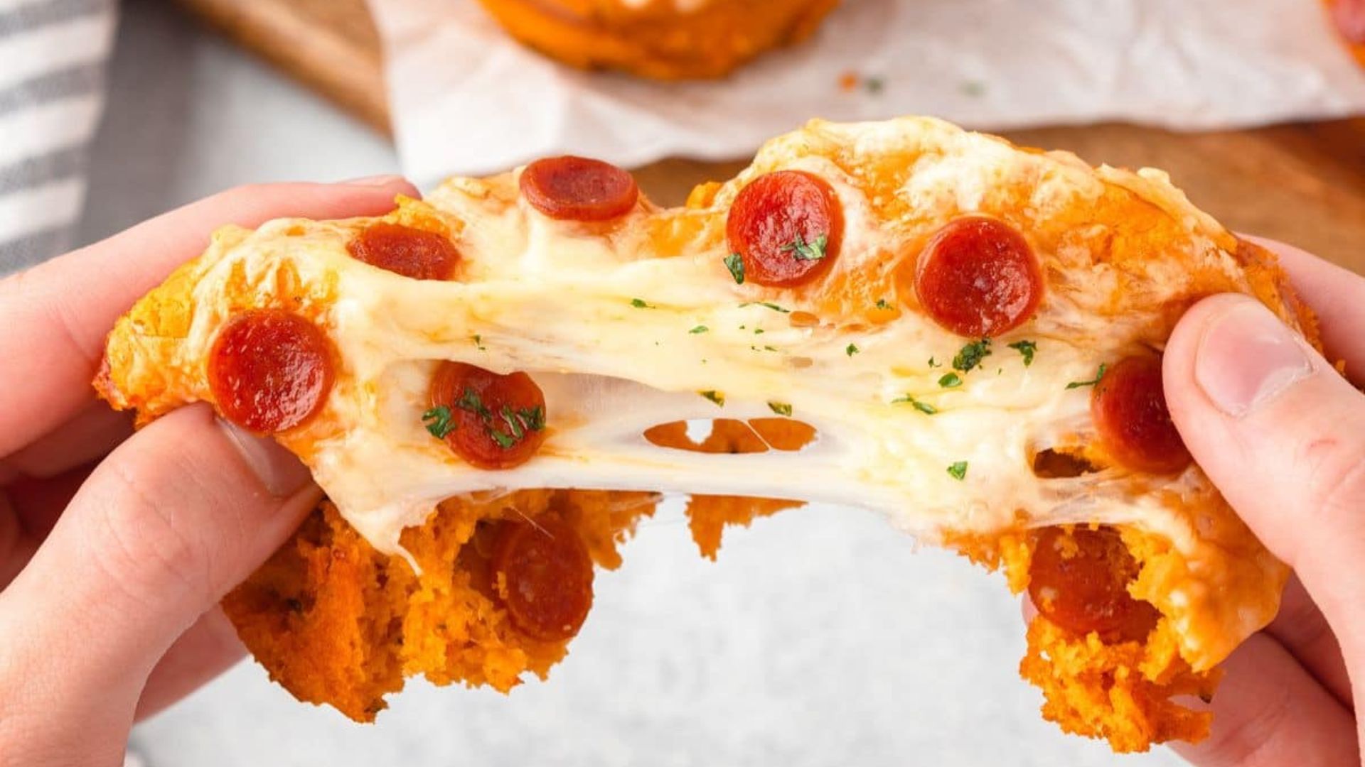 Pizza cupcake pulled cheese.
