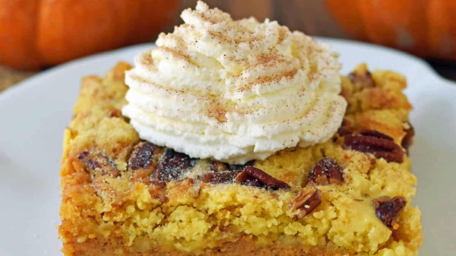Pumpkin praline butter cake on a plate.