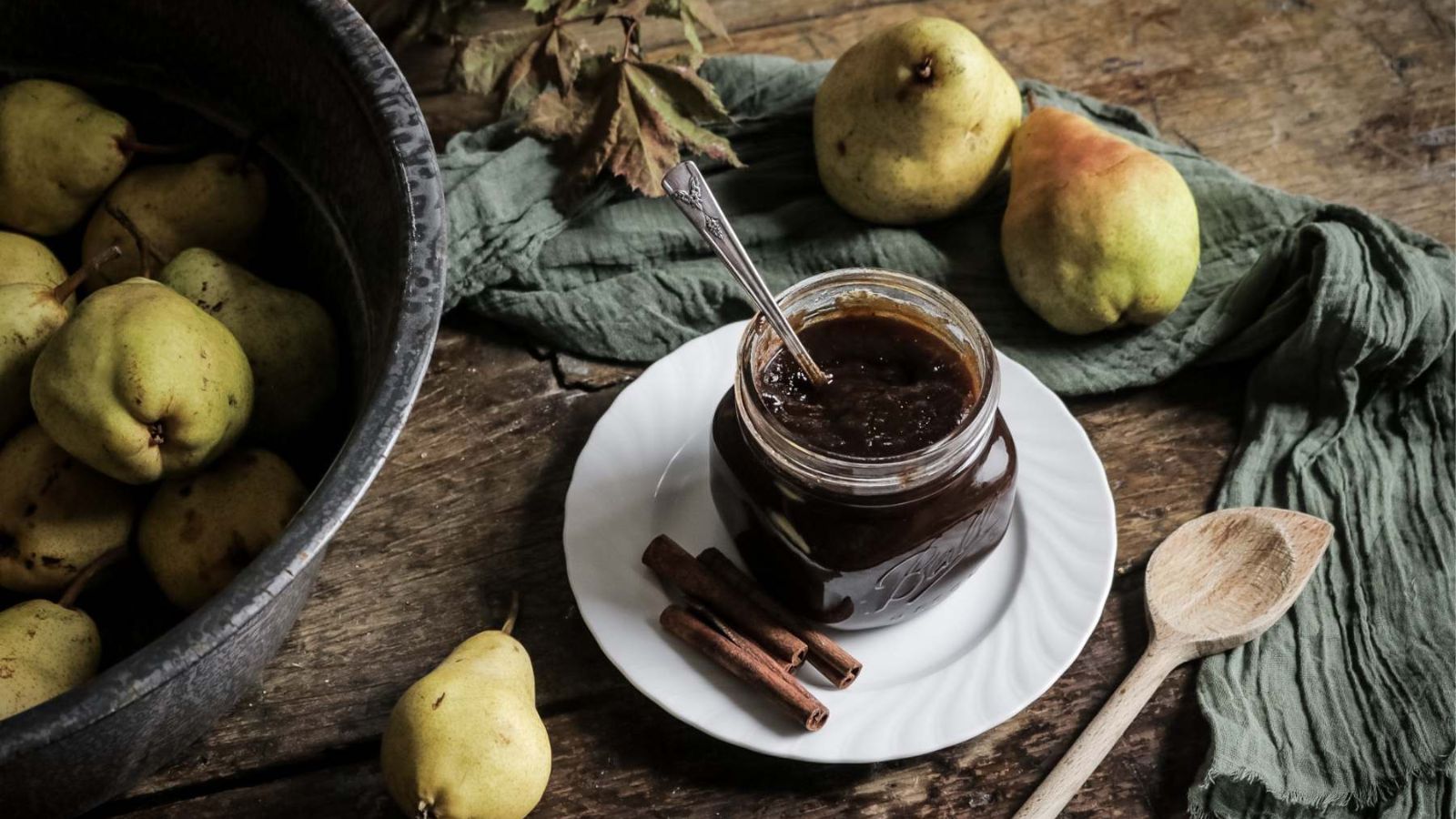 Caramel pear butter in a glass jar.