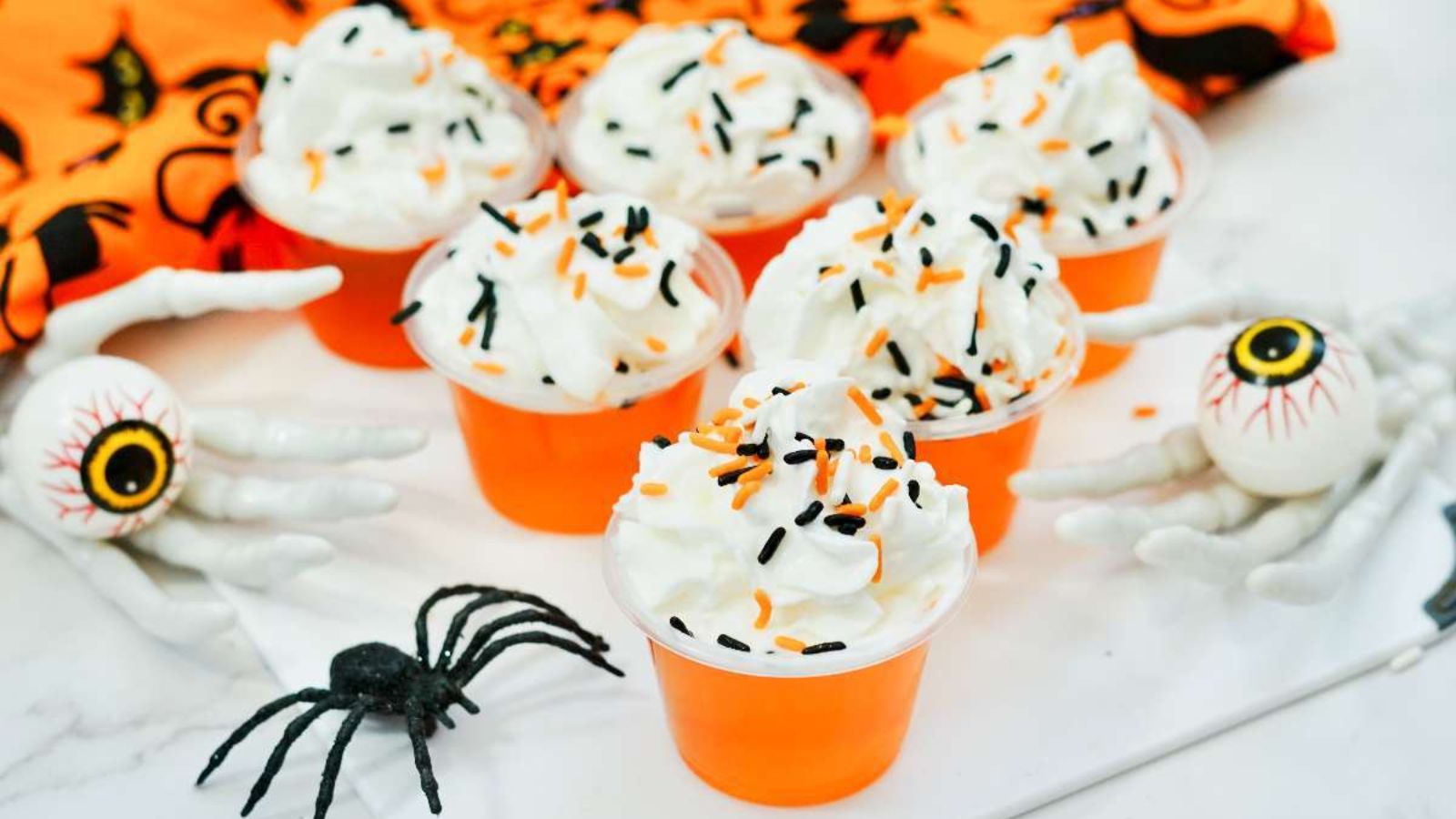 Halloween jello shots with sprinkles.