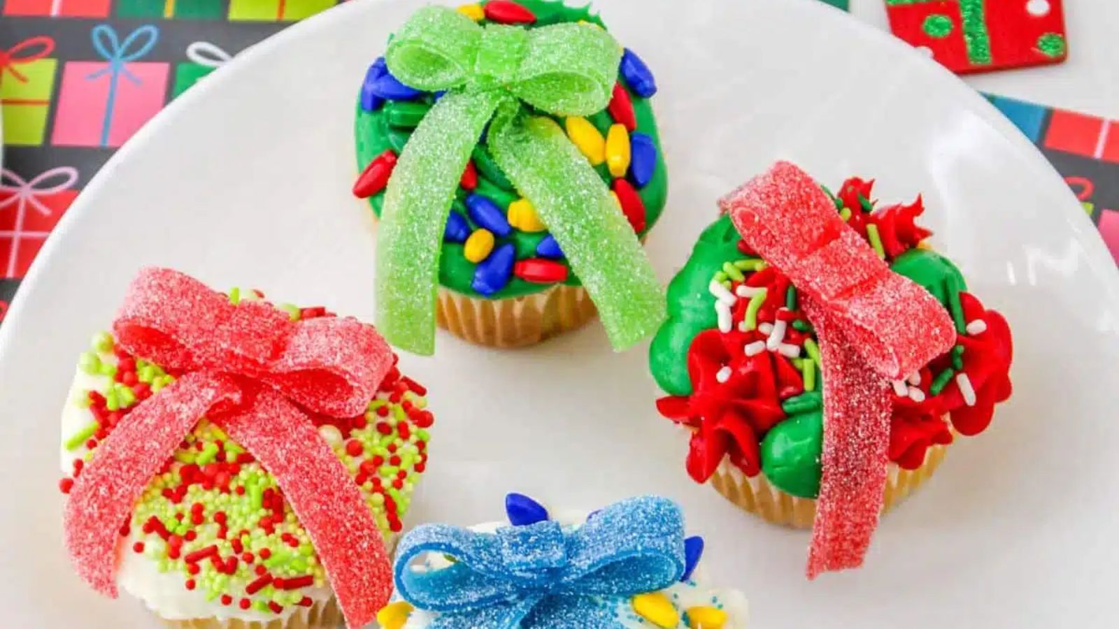 Colorful cupcakes on a plate.