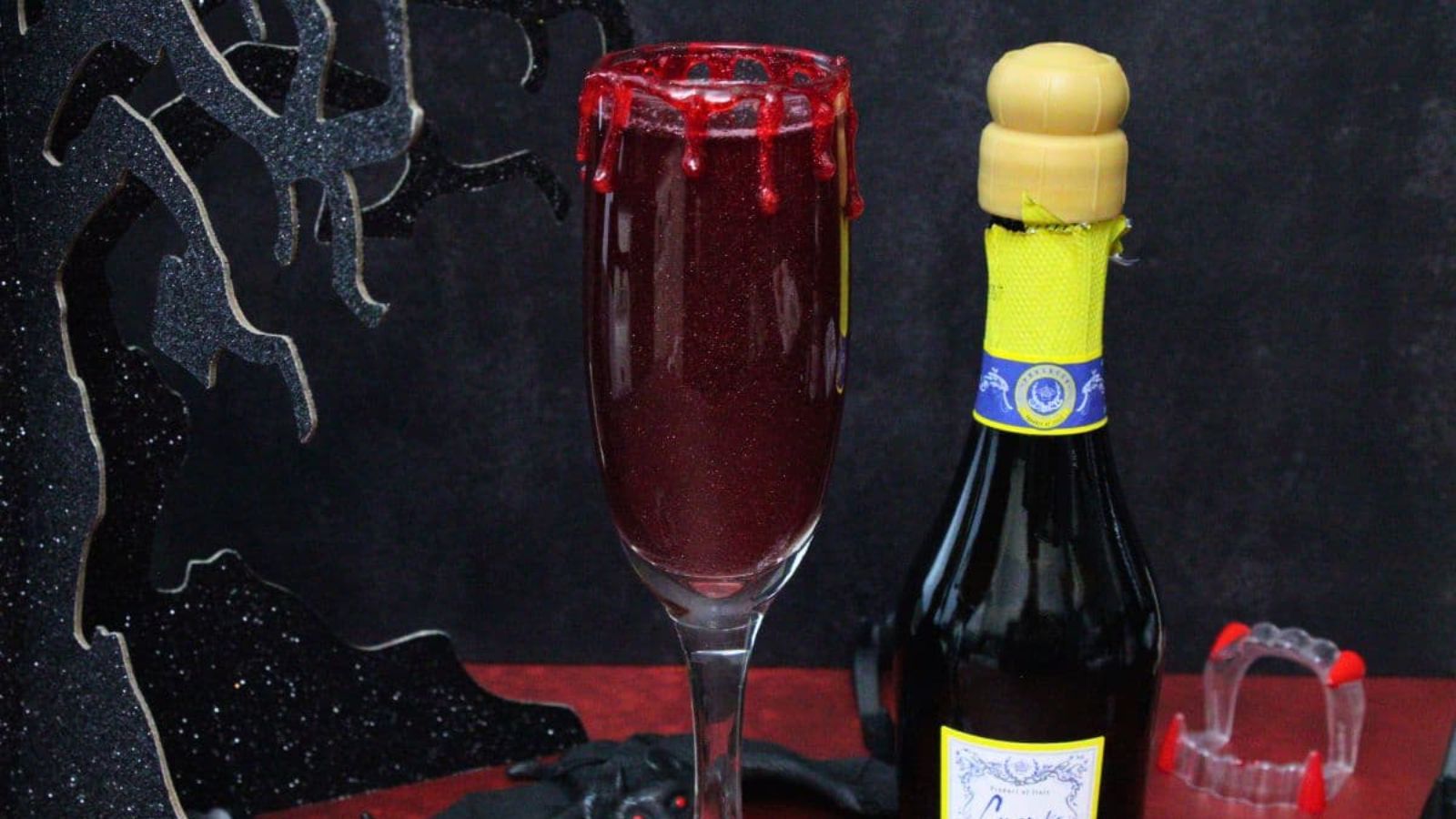 Mimosa cocktail in glass with syrup.