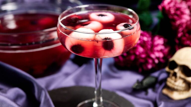 Witches brew eyeball punch in cocktail glass.