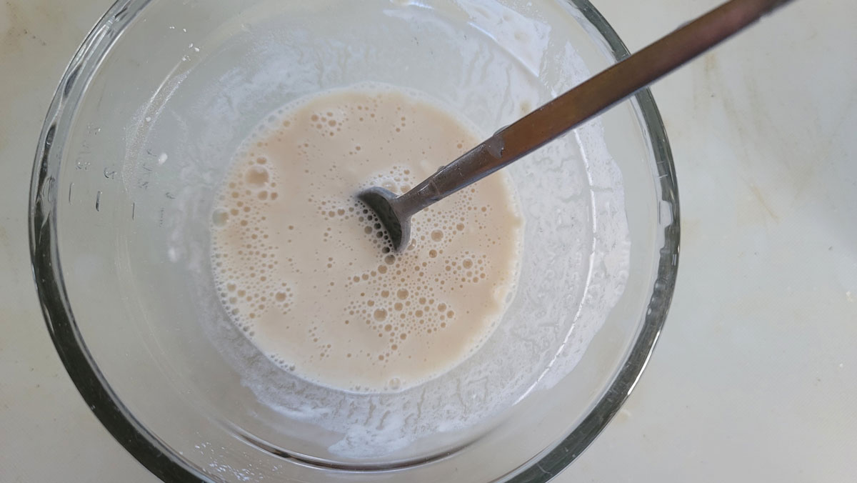 Water added to flour to make a thickener.