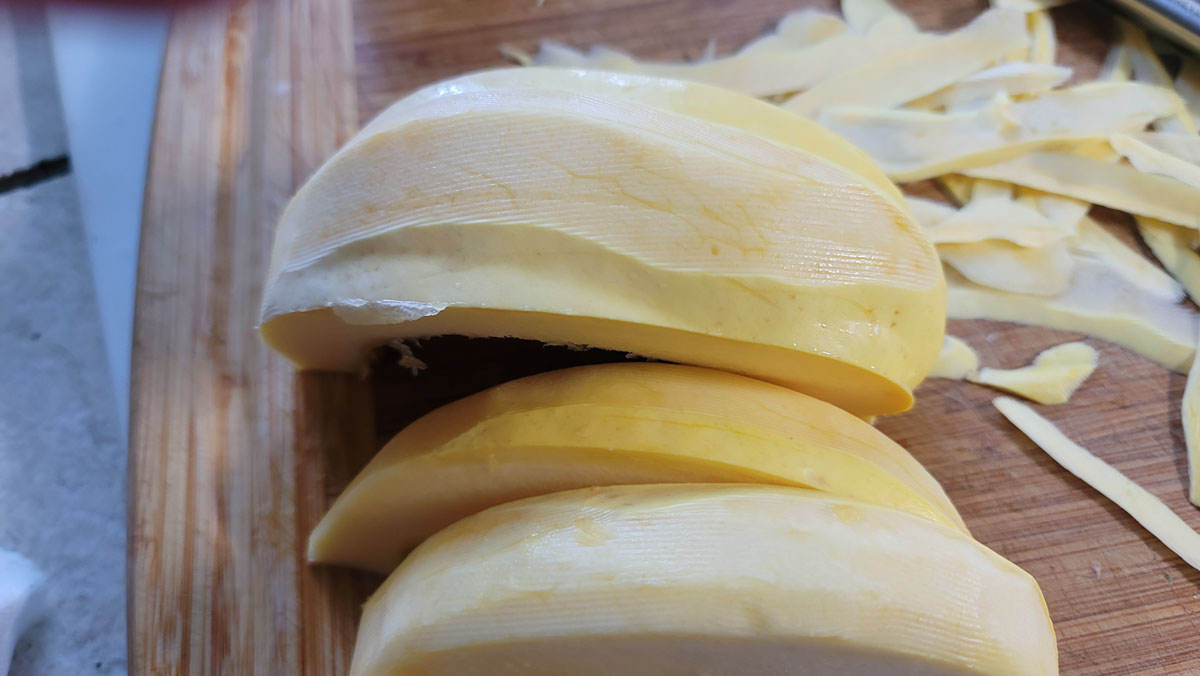 Squash cut into pieces so it can be peeled.