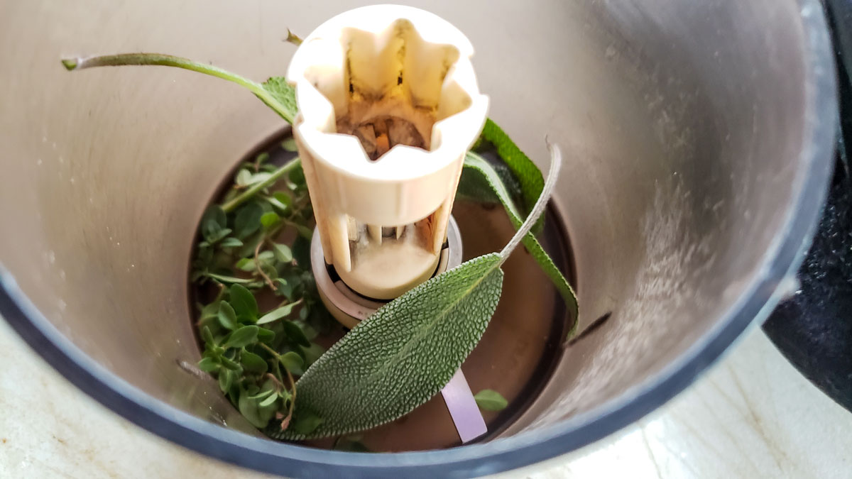 Herbs in a mini food processor.