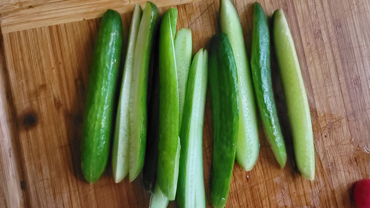 Mini cucumbers sliced into sticks.
