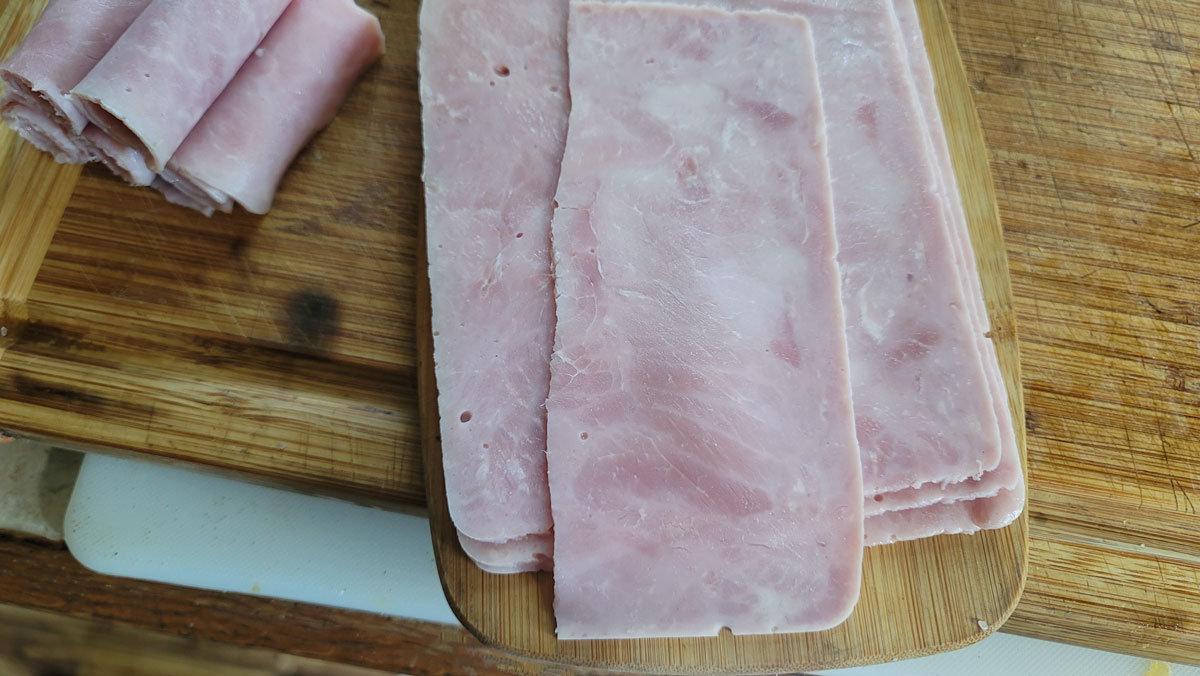 Rectangular piece of ham cut in half.