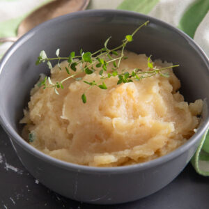 Mashed potato squash in a gray bowl.