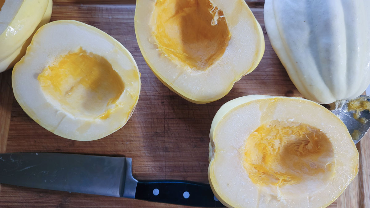 Squash cut in half with seeds scooped out.